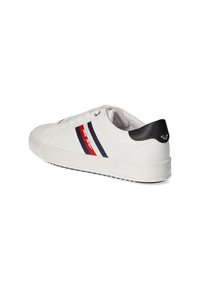 White leather sneakers featuring navy and red stripes, round toe, and a black heel accent. Rubber sole provides traction.