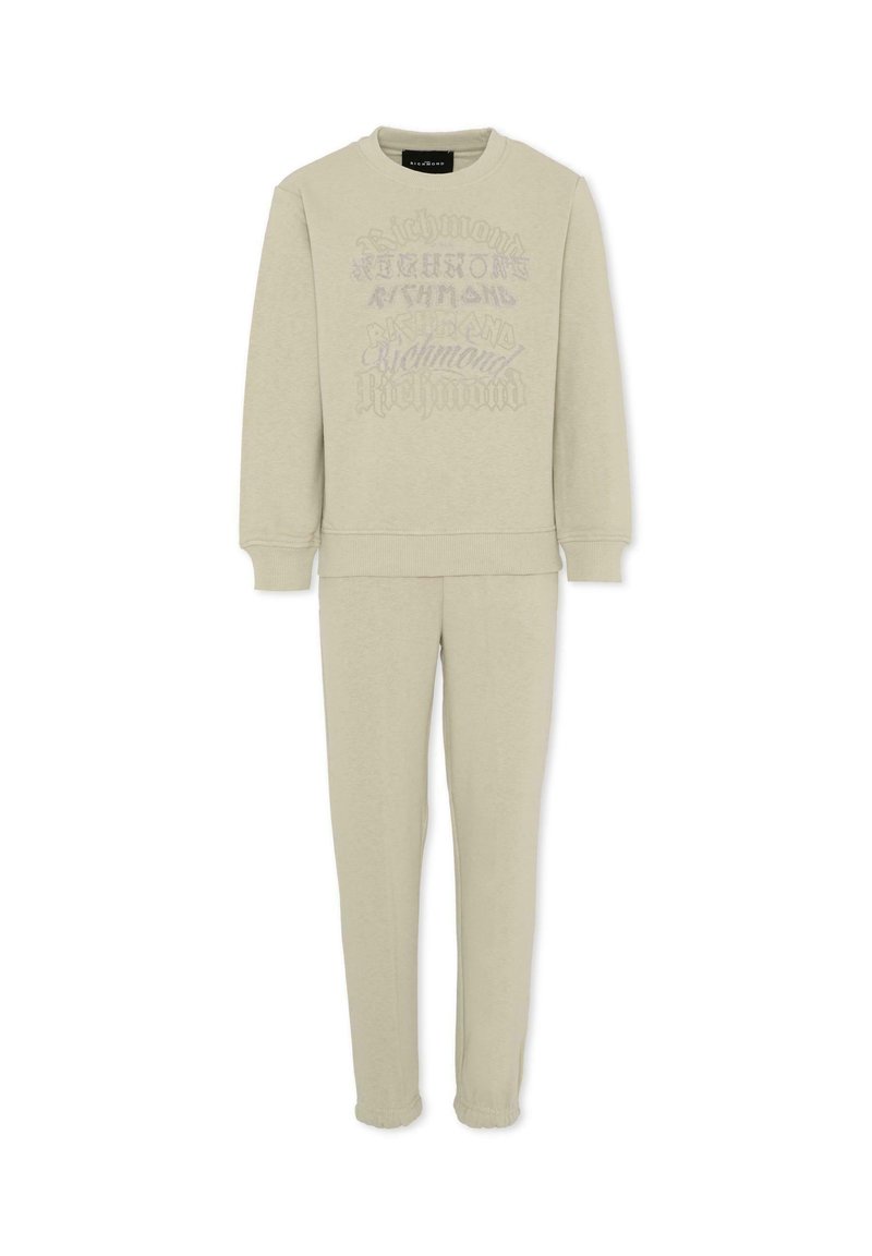 Ensemble de sweat-shirt et pantalon assorti beige clair, fabriqué en tissu doux. Le sweat-shirt présente un imprimé graphique texturé. Les pantalons ont des poignets élastiques.