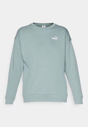 Heled roheline sviiter pika varrukaga, ümmarguse kaelusega ja väike valge Puma logo vasakul ülal. Valmistatud pehmest ja siledast kangast.
