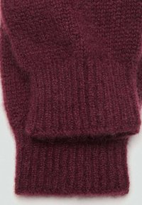 Mitten in magenta lavorato a maglia con texture a coste e polsino risvoltato. Realizzati in morbido tessuto, presentano un aspetto caldo e accogliente.