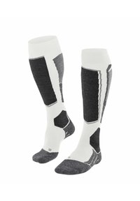 Calze fino al ginocchio grigie e bianche con un motivo geometrico. Realizzate in un tessuto a maglia testurizzato con talloni e punte rinforzati.