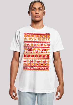 White cotton t-shirt featuring a colorful "Guns N' Roses" graphic design with red, orange, and yellow patterns, skulls, and floral motifs.