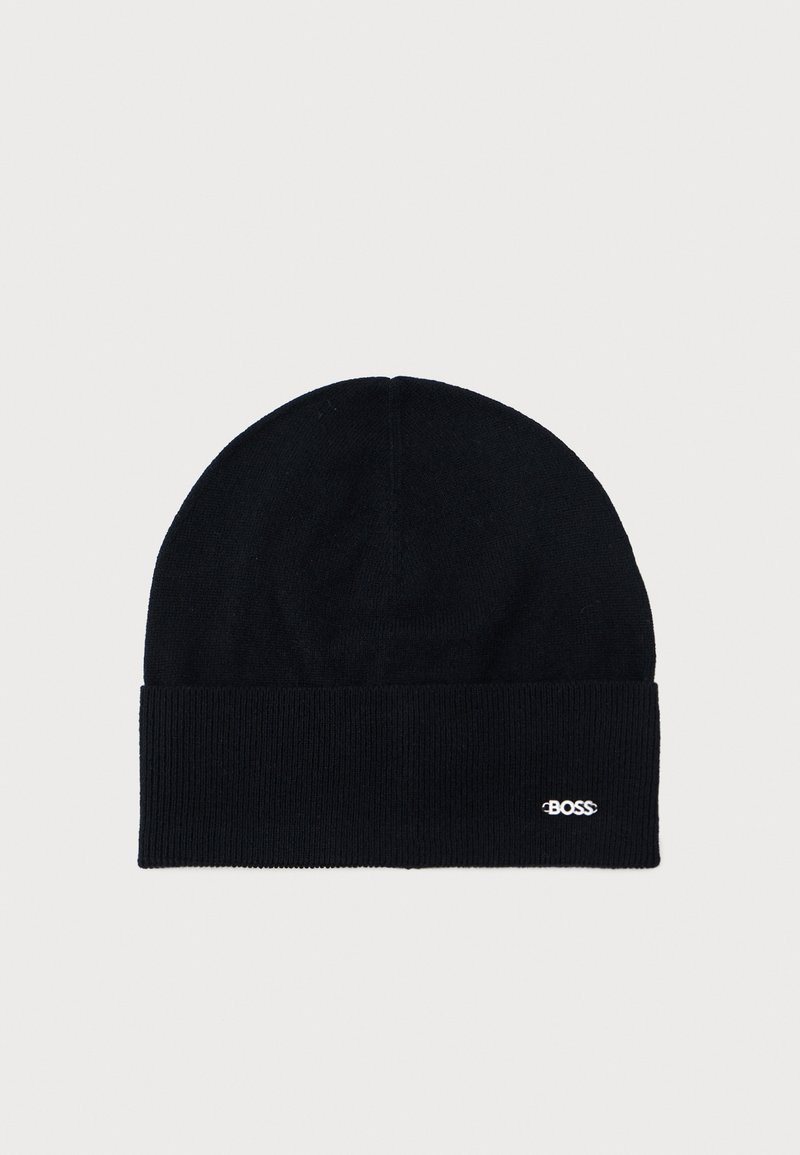 Black knit beanie with a folded brim. Features a subtle white embroidered logo. Soft texture and fitted shape, suitable for cold weather.