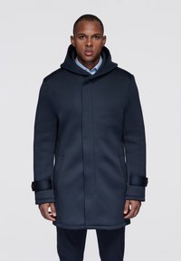 Navy blue coat with a hood; made from smooth fabric. Features a buttoned cuff, two side pockets, and a tailored fit.