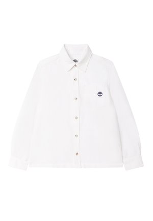 Chemise blanche à manches longues en tissu léger. Dotée d'un boutonnage sur le devant, d'une poche poitrine unique et d'un petit logo sur la poche.
