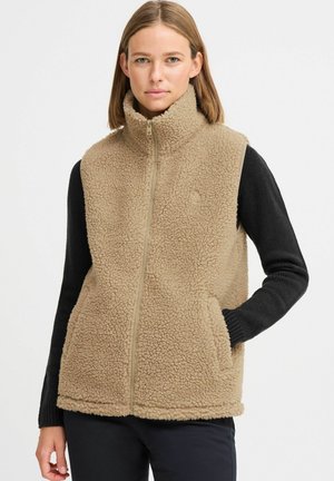 Fleece-Weste in Beige mit hohem Kragen, Frontreißverschluss und Seitentaschen. Mit schwarzen langen Ärmeln und strukturiertem Stoff.