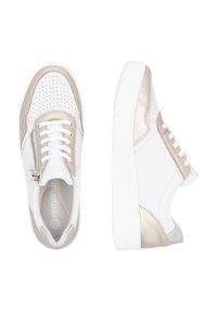 White sneaker with beige accents, features perforated panels, flat laces, a side zipper, and a textured white sole.