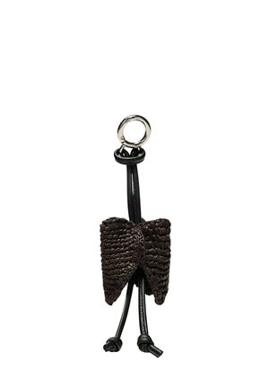 Portachiavi con un fiocco nero intrecciato legato attorno a un cordoncino nero ad anello, con una chiusura ad anello in metallo argentato nella parte superiore.