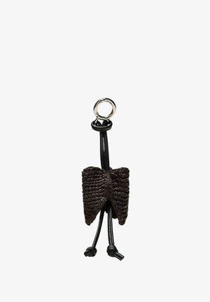 Portachiavi con un fiocco nero intrecciato legato attorno a un cordoncino nero ad anello, con una chiusura ad anello in metallo argentato nella parte superiore.