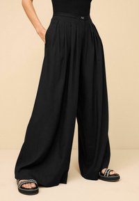 Next SUPERWIDE - Kalhoty - black