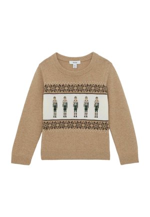 Pull en maille beige avec cinq figurines de casse-noisette dans des bandes à motifs vert foncé et marron sur la poitrine et les poignets.