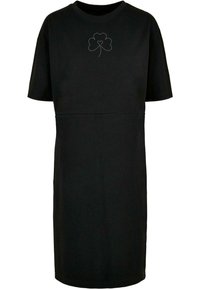 Schwarzes Baumwoll-T-Shirt-Kleid mit kurzen Ärmeln, das auf der Vorderseite ein graues Kleeblatt-Graphic und einen geraden Schnitt aufweist.