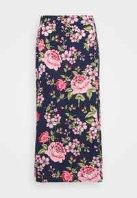 Saia maxi floral com rosas cor-de-rosa e flores brancas sobre um fundo azul-marinho. Confeccionada em tecido leve com uma silhueta reta.