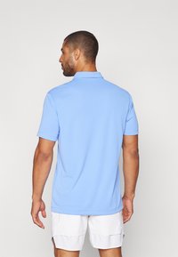 Nike Performance SOLID - Poloskjorter - royal pulse/white