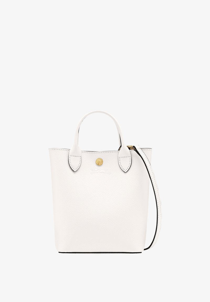 White leather tote bag with rounded handles, gold hardware, and a detachable strap. Features textured grain and black edging. Simple design.
