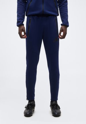 TIRO  - Spodnie treningowe