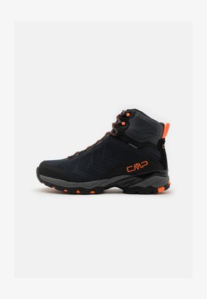 High-top hiking boots in black fabric with orange accents. Features waterproof material, robust sole, and visible lacing system. CMP branding displayed.