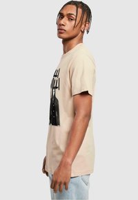 Merchcode UNISEX piaskowy