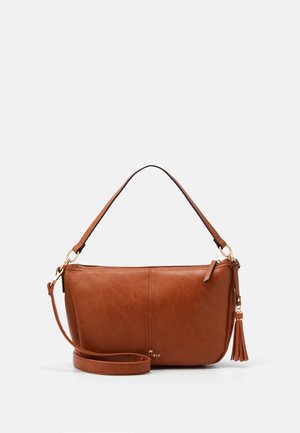 Brown leather handbag with top handles, detachable shoulder strap, gold hardware, and tassel accent on a white background.