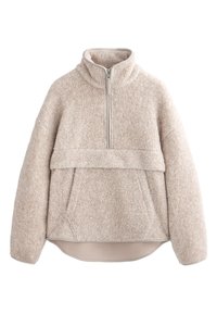 Beige, gestructureerde fleece pullover met een hoge kraag, rits tot halverwege en een vo zak. Heeft brede mouwen en een gebogen zoom.