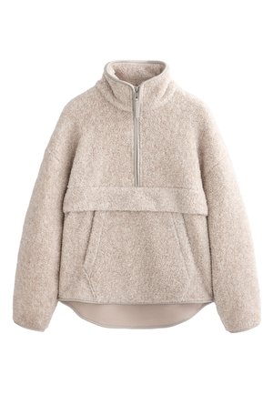 Pull de fleece beige texturé avec un col haut, une fermeture éclair mi-longue et une poche avant. Il possède des manches larges et un ourlet arrondi.