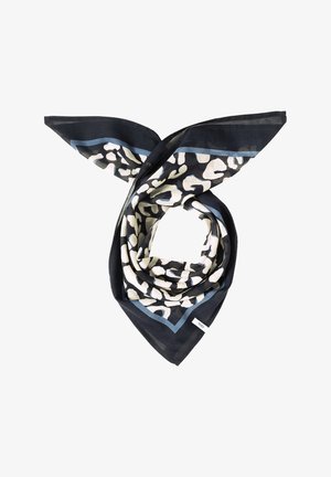 Foulard carré imprimé léopard noir et blanc avec bordure bleue, plié de manière lâche avec une étiquette de marque visible sur un bord.
