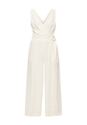 Combinaison blanche à encolure V profonde, jambes larges et détail de lien sur le côté. Fabriquée en tissu léger avec un minimum de coutures.