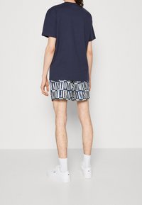 Tommy Jeans T-shirt med print - blue