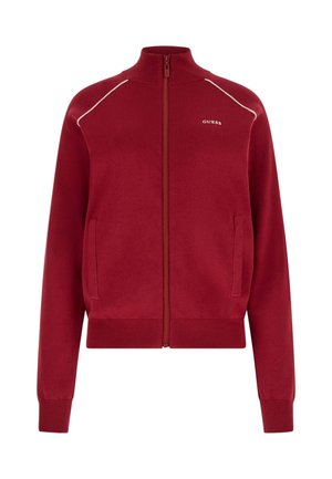 Pull rouge à fermeture éclair avec poignets et ourlet côtelés, passepoils blancs sur les épaules, et petit logo blanc "GUESS" sur la poitrine gauche.