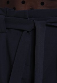 KIOMI Kalhoty - dark blue