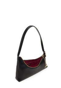 Black leather handbag with a curved design, gold zipper, and a maroon interior. Features a long, adjustable strap and a decorative chain accent.