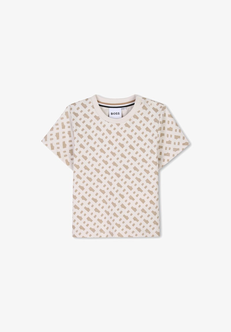 T-shirt beige à manches courtes avec un motif en grille marron clair, fabriqué en tissu doux, avec deux boutons-pression à l'épaule.
