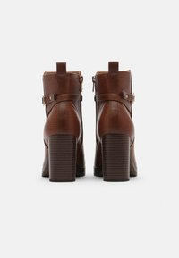 Anna Field Botas de tornozelo com plataforma - cognac