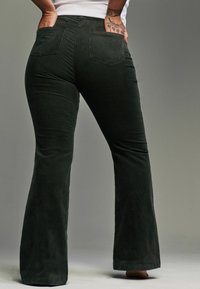 Next HOURGLASS FLARED - Housut - green