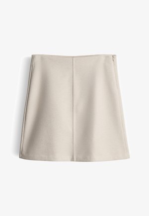 Minigonna beige con una texture liscia, design strutturato e una discreta cerniera laterale. Presenta una silhouette pulita e semplice senza motivi.