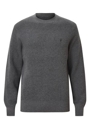 Grijze geribbelde trui met een ronde hals, lange mouwen en een klein logo op de linkerborst. Gemaakt van een zachte breimateriaal.