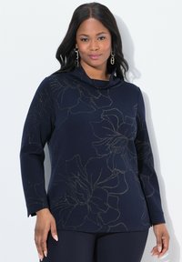 Maglione con collo a cowl in navy, maniche lunghe, caratterizzato da un motivo floreale metallico, tessuto morbido e una vestibilità comoda e rilassata.