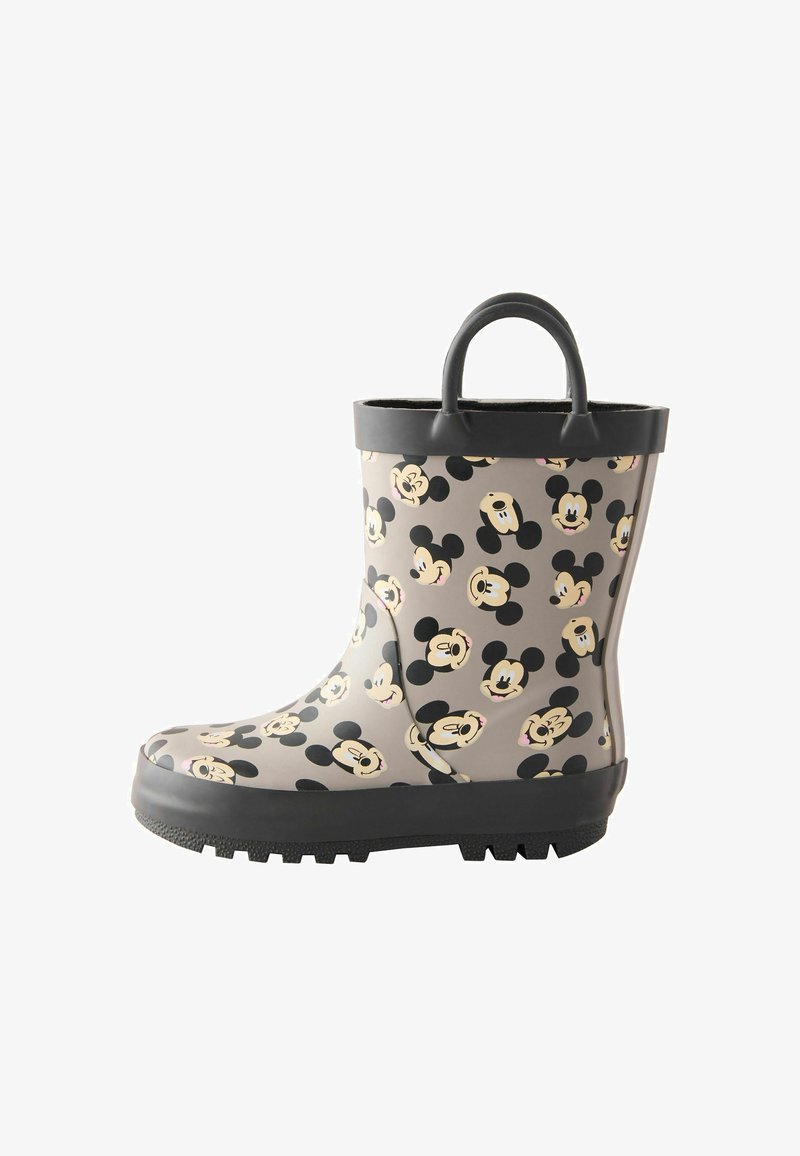 Rubber rain boot in gray with black and beige Mickey Mouse pattern. Features a textured sole and a black handle at the top.