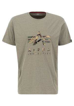 Olive green cotton t-shirt featuring a camo print logo with a geometric design and the text "ALPHA INDUSTRIES" beneath it. Short sleeves.