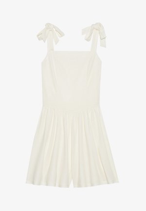 Balti romperis su reguliuojamais kaspinų petnešomis, prigludusia liemene ir išsiplėtusiu sijonu, pagamintas iš minkštos, tekstūruotos medžiagos patogumui.