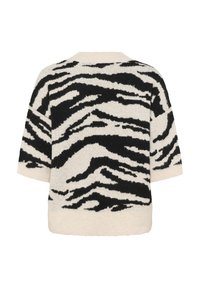 Knit sweater featuring a black and white zebra pattern, short sleeves, and a relaxed fit. Soft texture with ribbed trim at the hem.