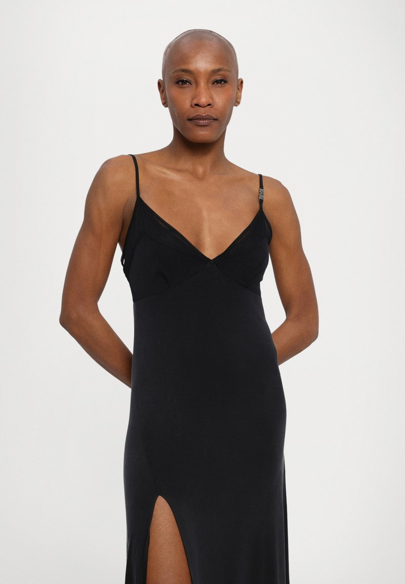 maxi mesh dress black Long Sleeve Embellished Backless Maxi Dress in Black - 12 main image 1