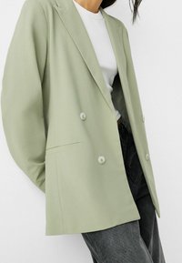 Bershka Kort kappa / rock - green