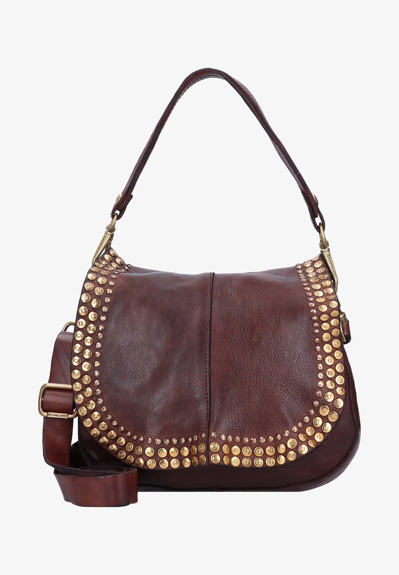 Sac à main en cuir marron avec une bandoulière, offrant des clous en ton doré le long des bords et une texture lisse et douce.