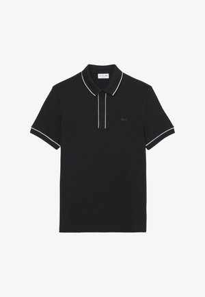 Zwarte poloshirt van katoen met witte bies op de kraag en mouwen. Voorzien van een subtiel logo op de borst. Korte mouwen.