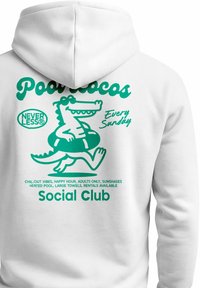 Walking cartoon crocodile with float ring, text "Pool Locos," "Every Sunday," and "Social Club" on white hoodie back.