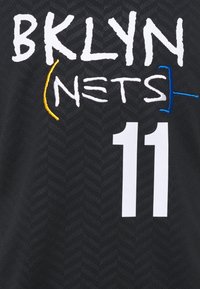 Black Brooklyn Nets basketball jersey with white number 11 and stylized white text "BKLYN NETS" with yellow and blue brackets.