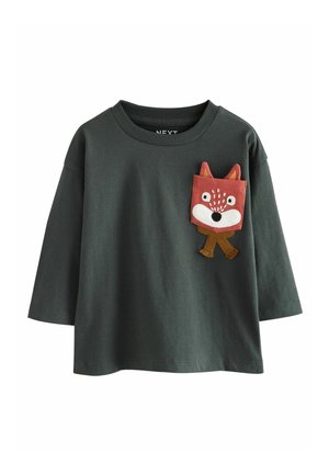 Dark green cotton T-shirt with crew neckline and long sleeves. Features a sewn-on pocket design of a fox with ears, facial details, and a bow.