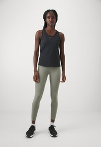 Nike Performance ZENVY HR 7/8 TGHT - Tights - light army