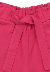 Pink fabric trousers with an elastic waistband and a tied bow detail at the front. Features a lightweight, textured material.